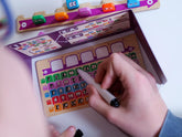 Got Five! – spiller noterer tal på notesarket, mens brikkerne ligger klar i holderen